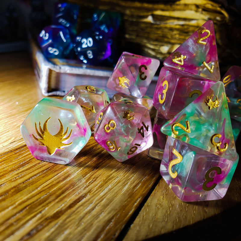 Set of colorful polyhedral dice on a wooden surface