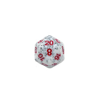 Close up of a white speckled d20 die with red numbers showing 20