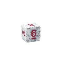 Dice with speckled surface and red numbers on a white background