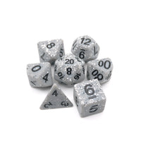 Set of gray dice with black numbers on a white background