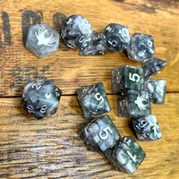 Set of dice with numbers on a wooden surface