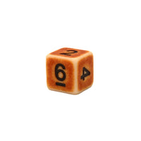 Close up of a single Ancient Bone d6 in beige resin with faded edges and black numbers, on white