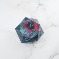 D20 polyhedral dice with tie-dye design and teal numbering on a marble background