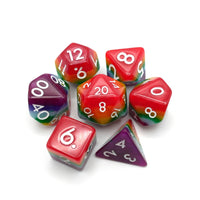 Set of colorful polyhedral dice on a white background